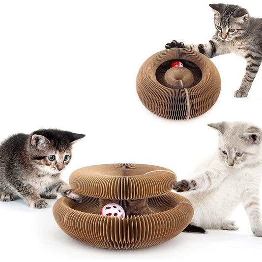 A brown corrugated cardboard cat toy with two rotating rings and a small ball, shown with three cats on a white background.