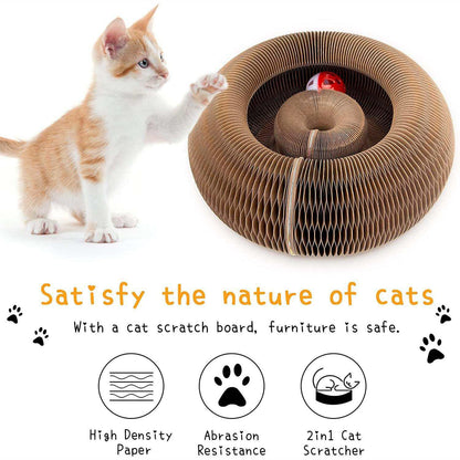 A small orange-and-white kitten stands beside a large circular cardboard cat scratcher toy on a white background. Below the toy, text reads 'Satisfy the nature of cats' and 'With a cat scratch board, furniture is safe,' with three feature icons for high density paper, abrasion resistance, and 2-in-1 cat scratcher.